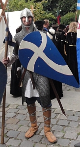Armoured knights of the group in a fighting show